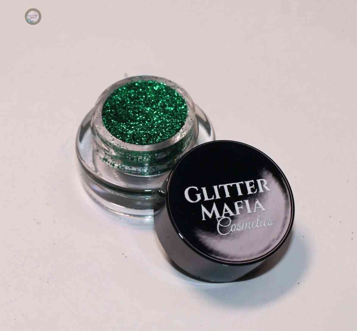 Begum Pressed Glitter in vibrant green by Glitter Mafia in small clear jar with black lid
