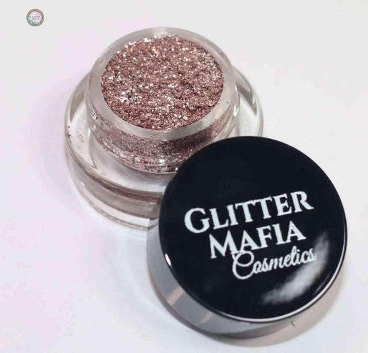 Glitter Mafia Bubblegum Pressed Glitter in clear round container with black lid on white background