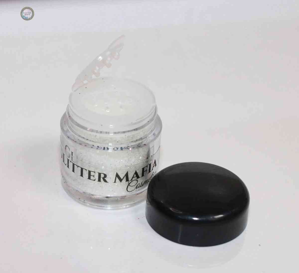Glitter Mafia Diamond Loose Glitter in a clear jar with black lid for cosmetic use