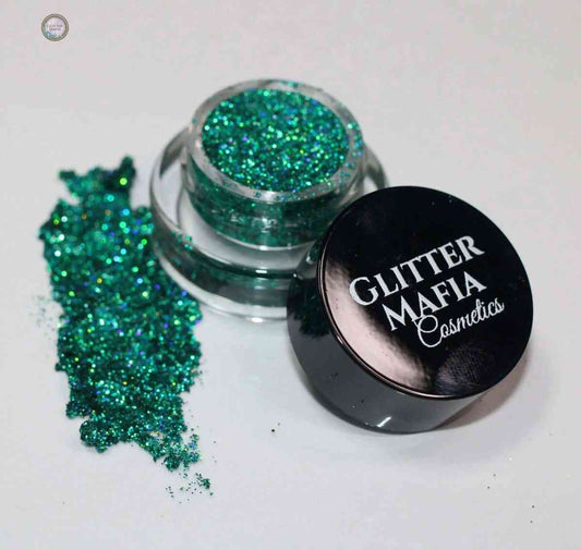 Glitter Mafia Flaunt Pressed Glitter in vibrant green shade with glitter spread next to the container