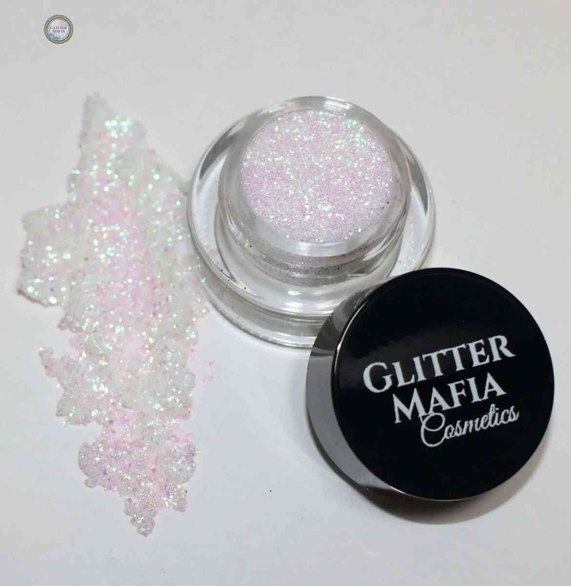 Glitter Mafia Mermaid Pressed Glitter in a clear container with black lid and sparkly pink glitter swatch