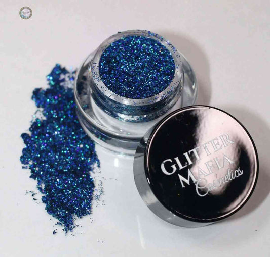 Glitter Mafia Peacock Pressed Glitter in vibrant blue shimmer with a black lid container