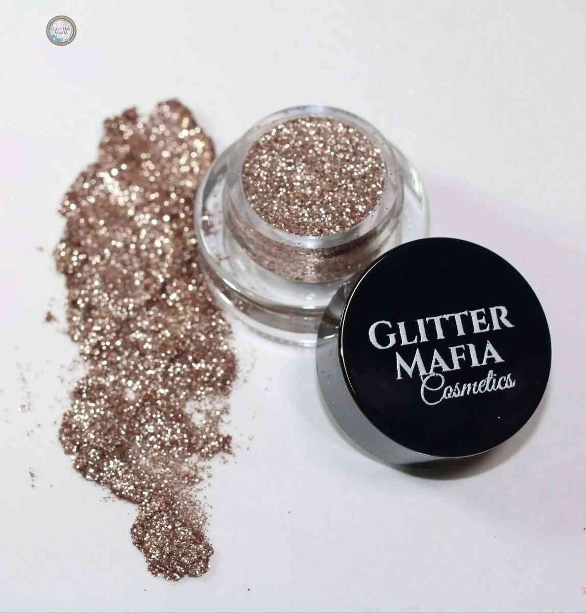 Glitter Mafia Rose Gold Pressed Glitter mini container with glitter spread beside it