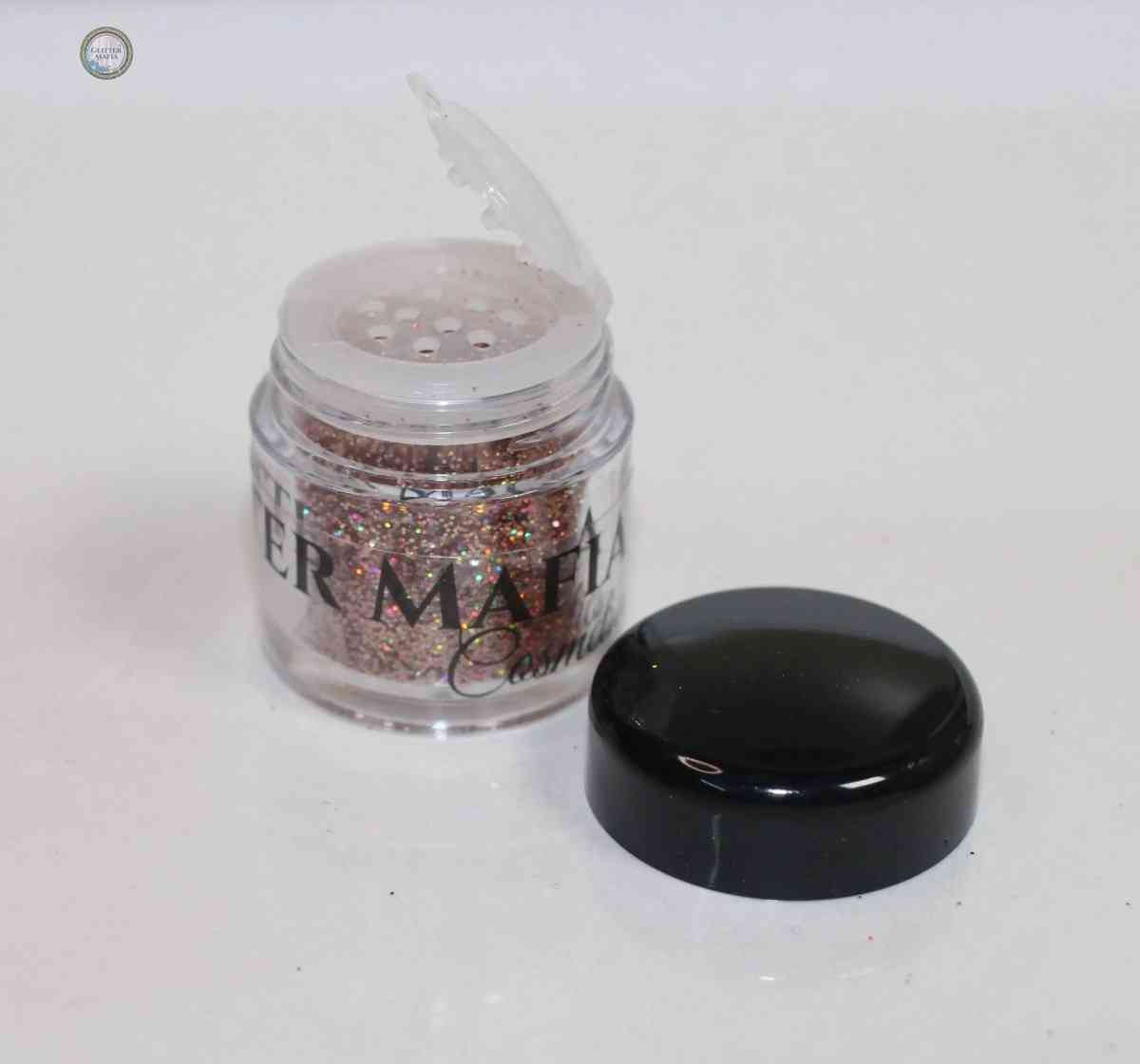 Glitter Mafia Midas Touch Loose Glitter in clear jar with black lid and sparkle visible inside