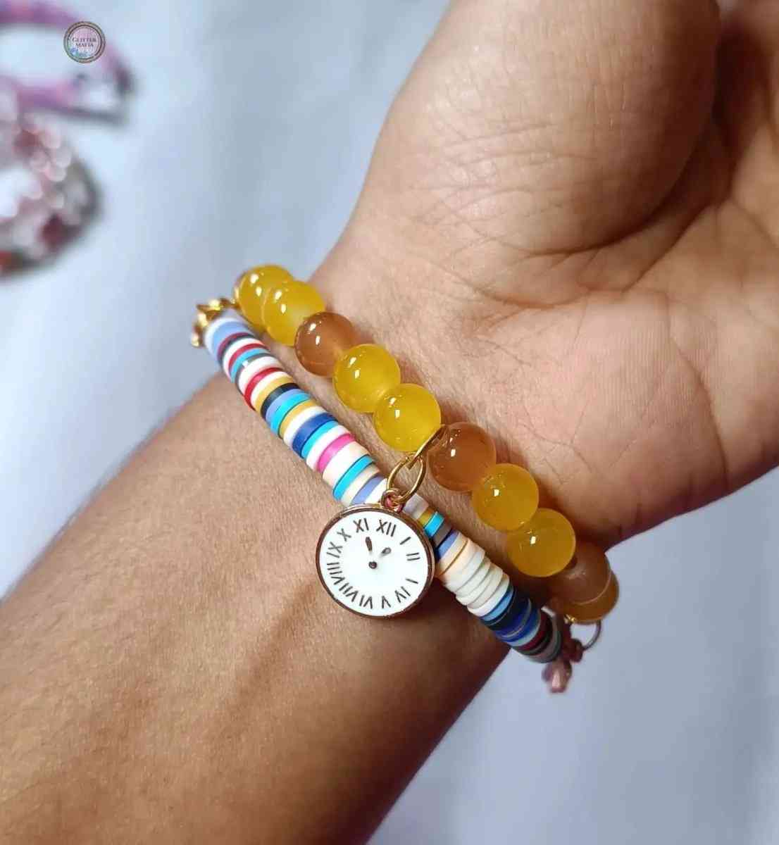 Set of 2 bracelet watch charm bracelet with colorful beads and a small clock charm on wrist