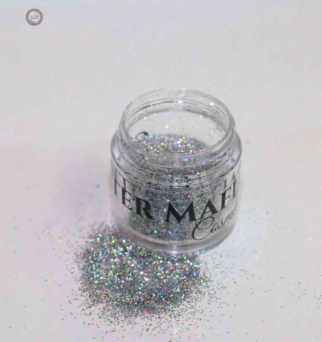 Glitter Mafia 24k Gold Fairfax Loose Glitter jar with spilled holographic glitter particles