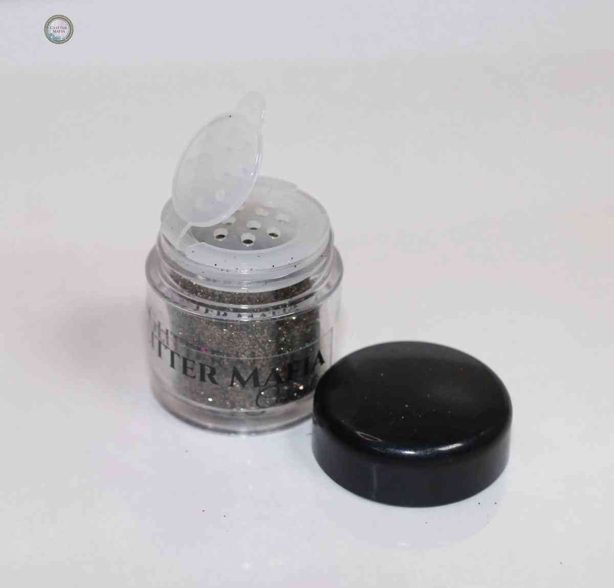 Glitter Mafia jar of Forest Green Loose Glitte with a black lid and a sifter top