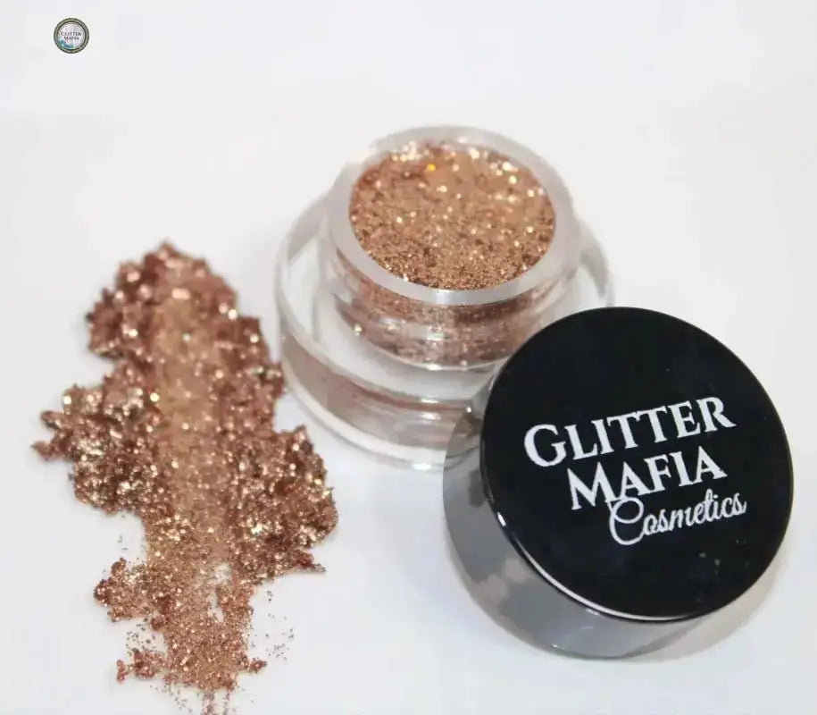 Glitter Mafia Cosmetics rose gold glitter pot with scattered glitter for Beginner's Kit makeup