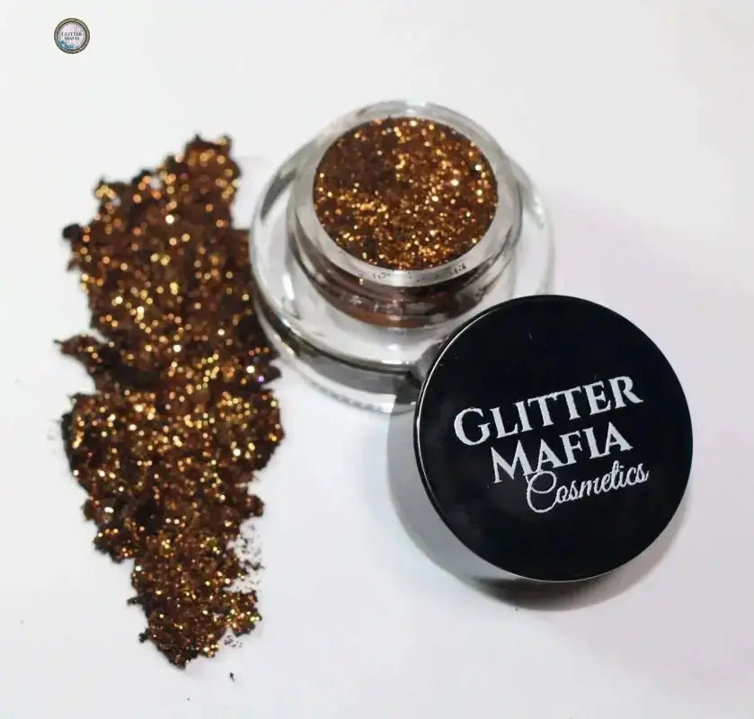 Glitter Mafia bronze glitter pot with spilled glitter for makeup in Beginner's Kit