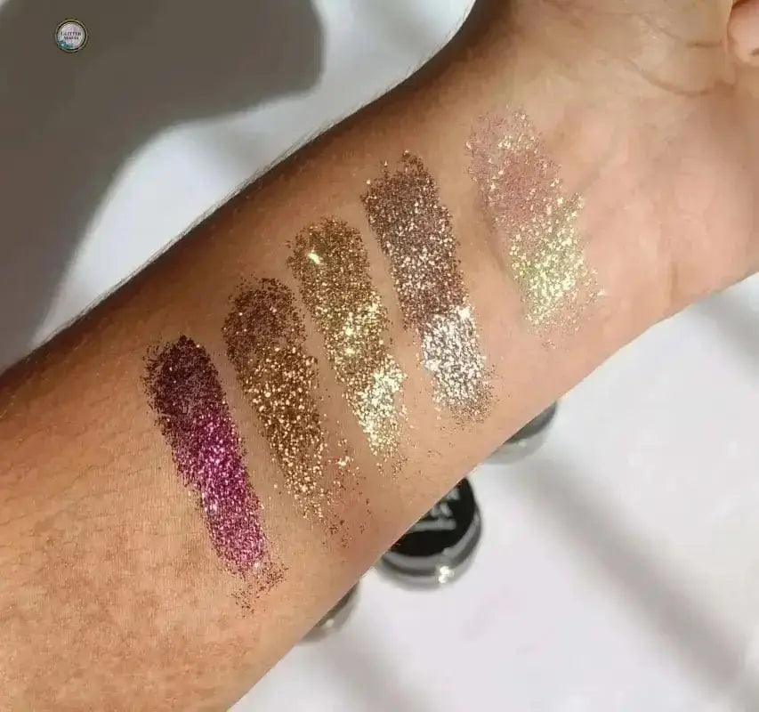Glitter Mafia Beginner's Kit shimmering glitter swatches on forearm in six sparkling shades
