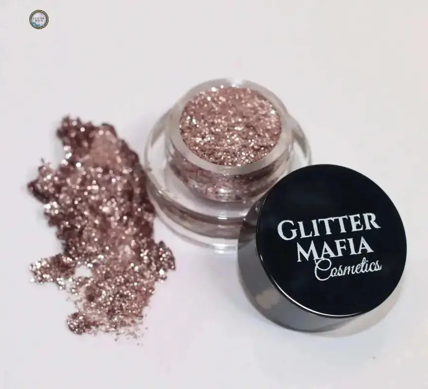 Glitter Mafia Cosmetics rose gold glitter pot with spilled glitter for Beginner's Kit makeup