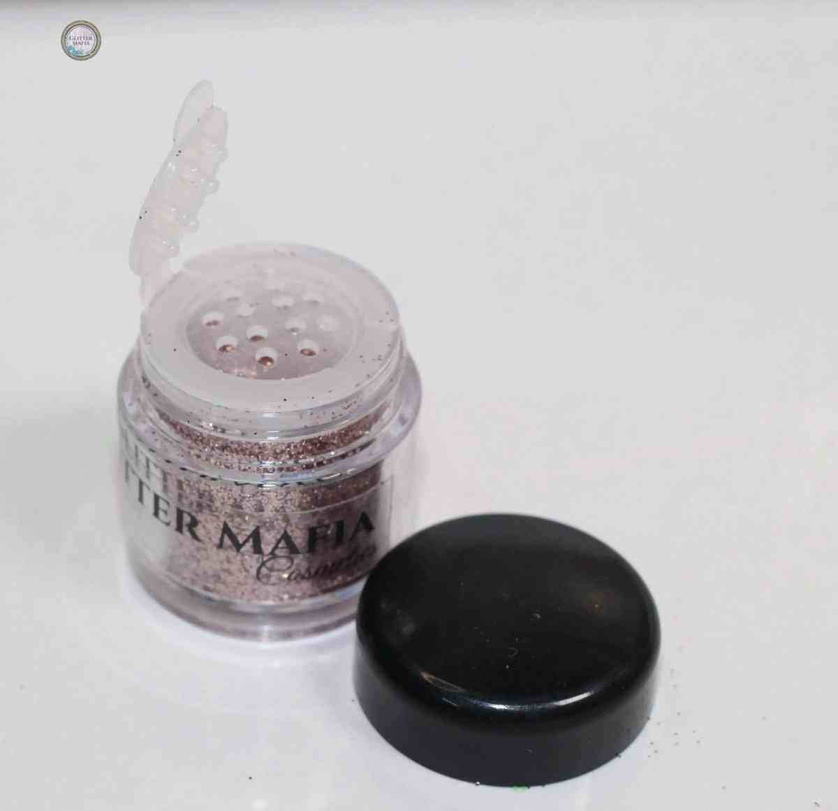 Glitter Mafia blush pink Bubblegum Loose Glitter in a clear jar with black lid beside it