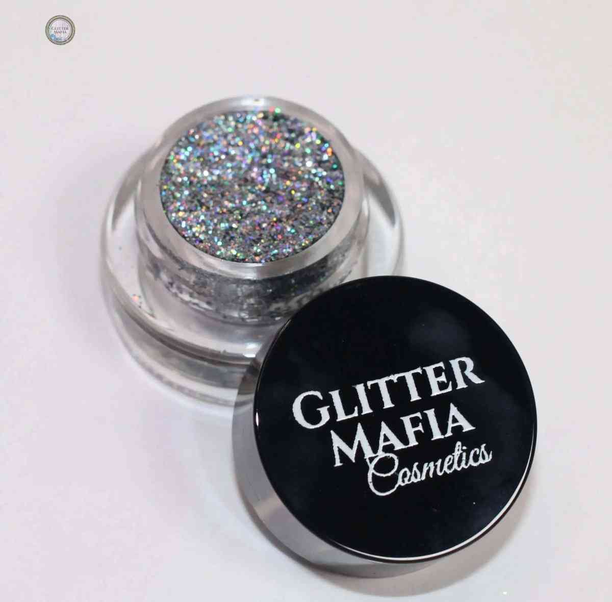 Glitter Mafia Moonstone Pressed Glitter 24K Gold Pressed Glitter in clear jar with black lid