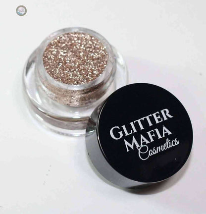 Glitter Mafia Rose Gold Pressed Glitter in a small clear container with black lid