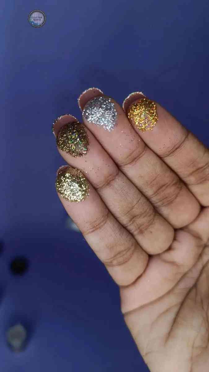 Fingertips covered with various glitter shades from Glitter Mafia Loose Glitters Combo 30Shades collection