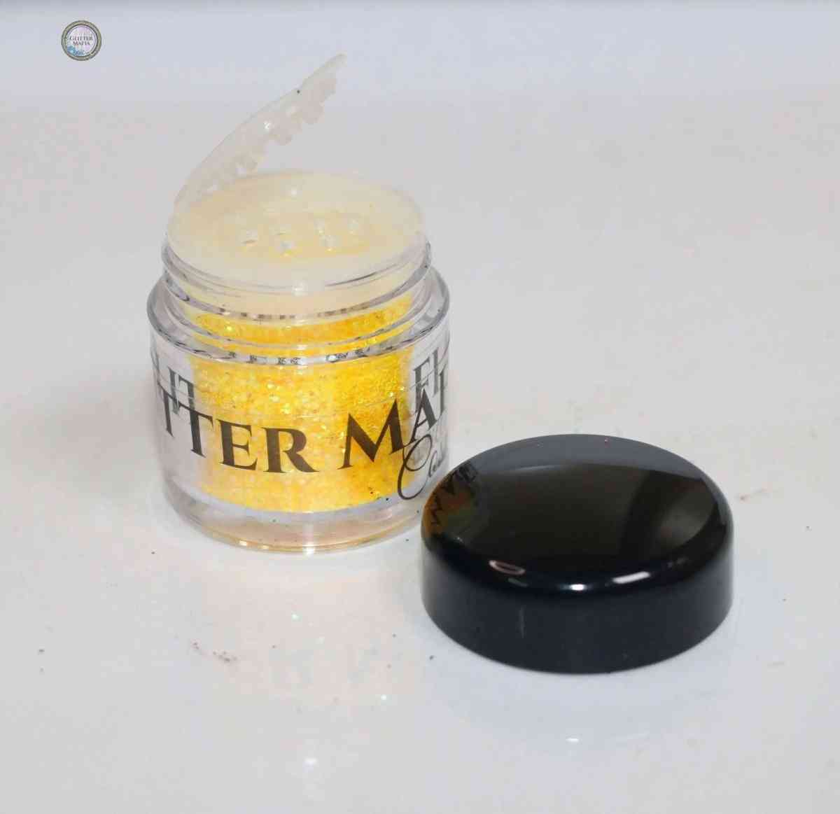 Glitter Mafia Mango Punch Loose Glitter in clear jar with black lid for vibrant yellow sparkles