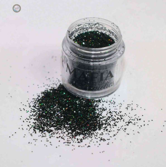Glitter Mafia Azure jar with Pretty Green Loose Glitter spilled on white background