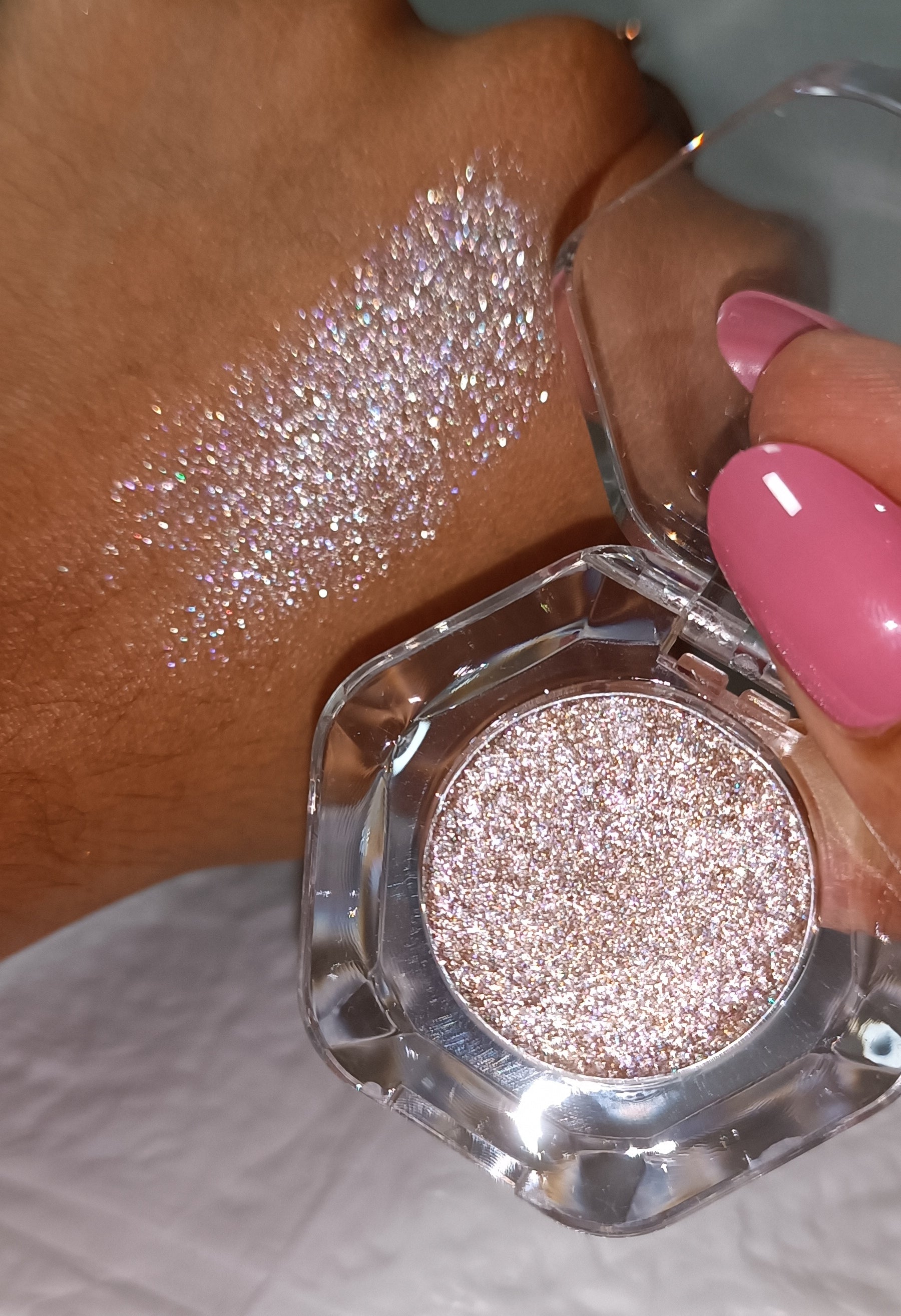 Glitter Mafia Rose Quartz Melt- Soft Rosegold with molten sparkle. pressed glitter eyeshadow pot and hand swatch